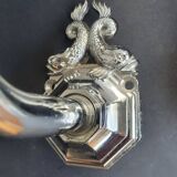 Pair of chrome wall sconces for bathroom with vintage fish pattern.