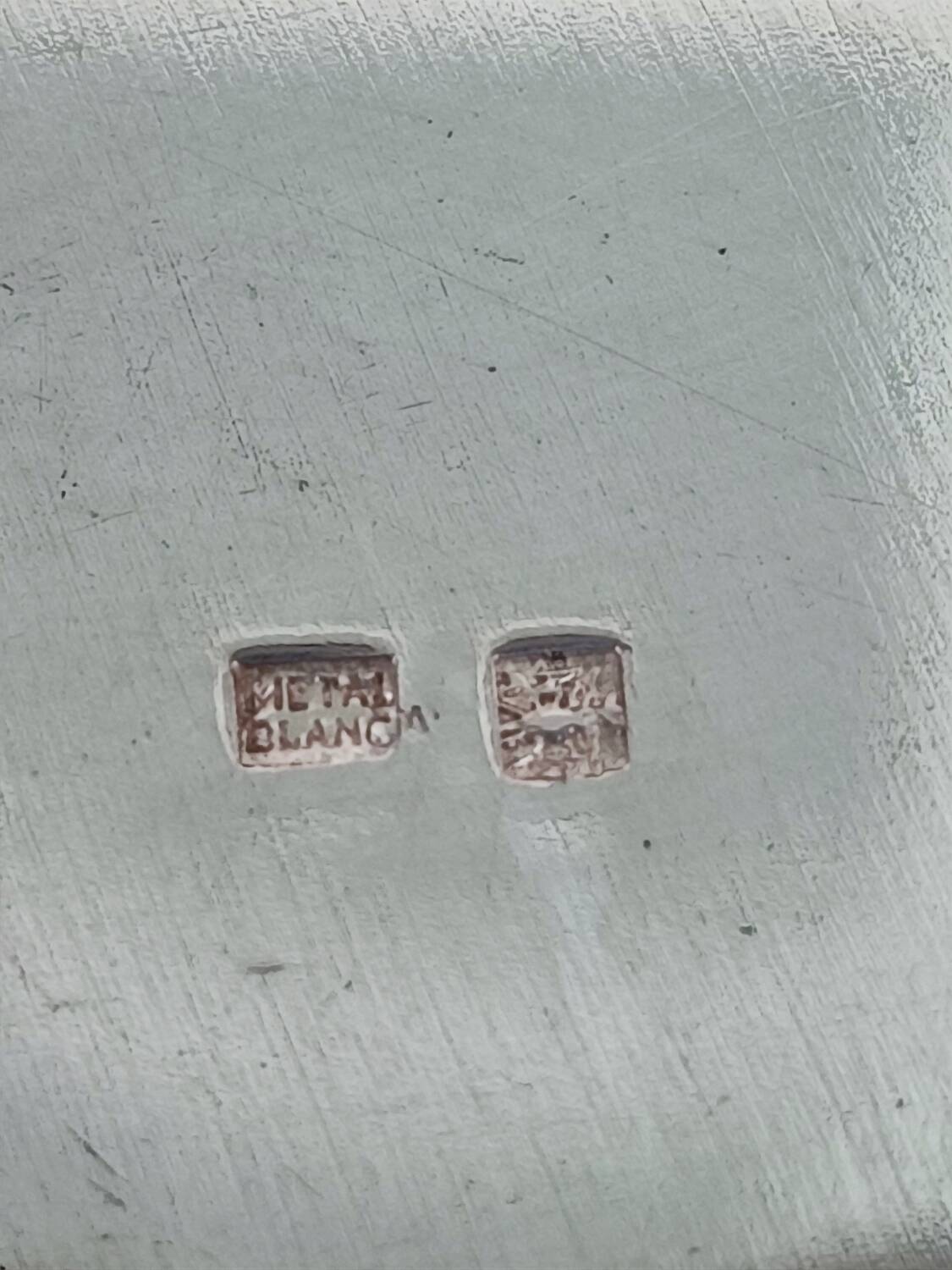 Trois sous-verres en métal argenté