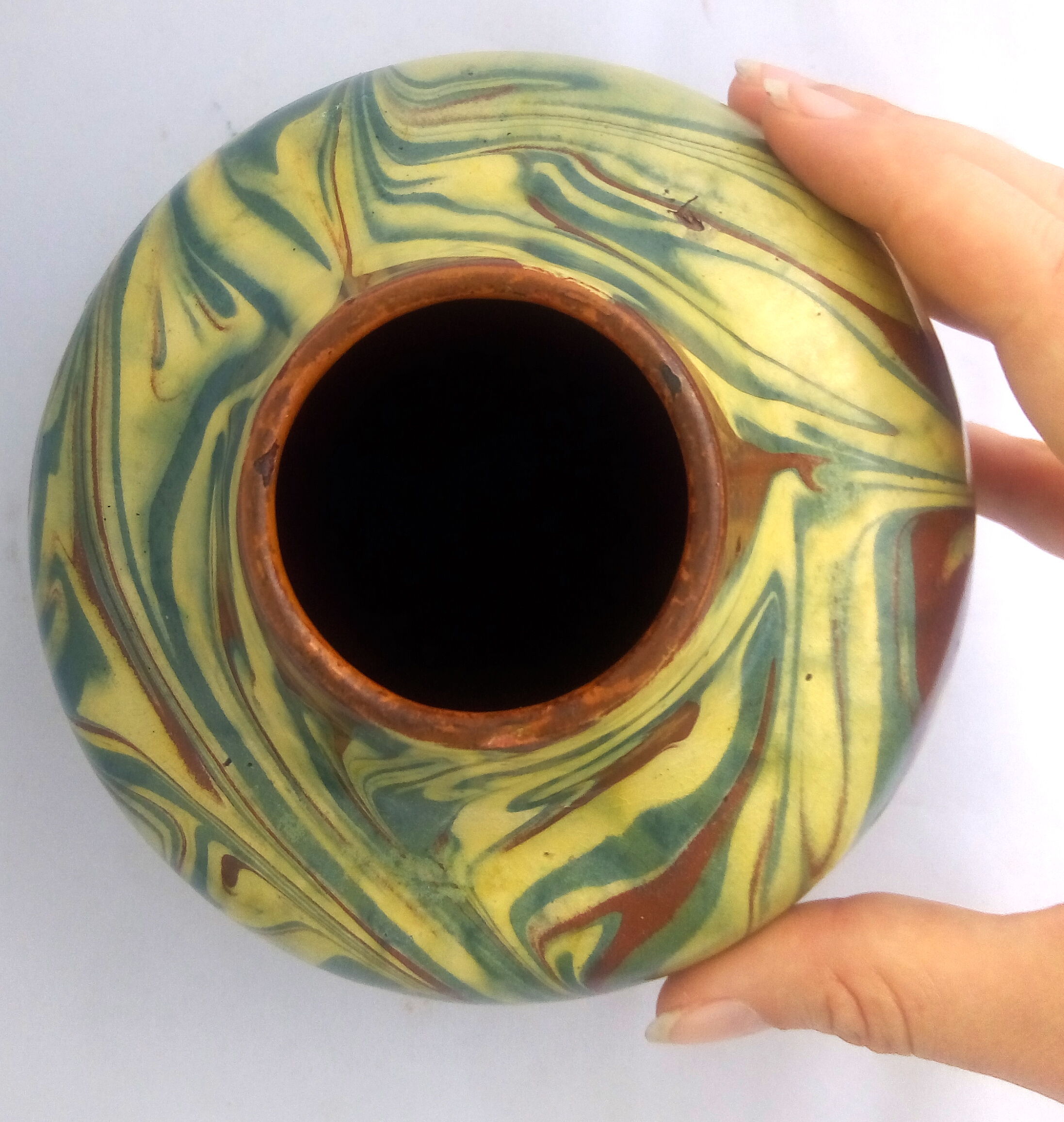 Brown, yellow and green marbled ceramic vase