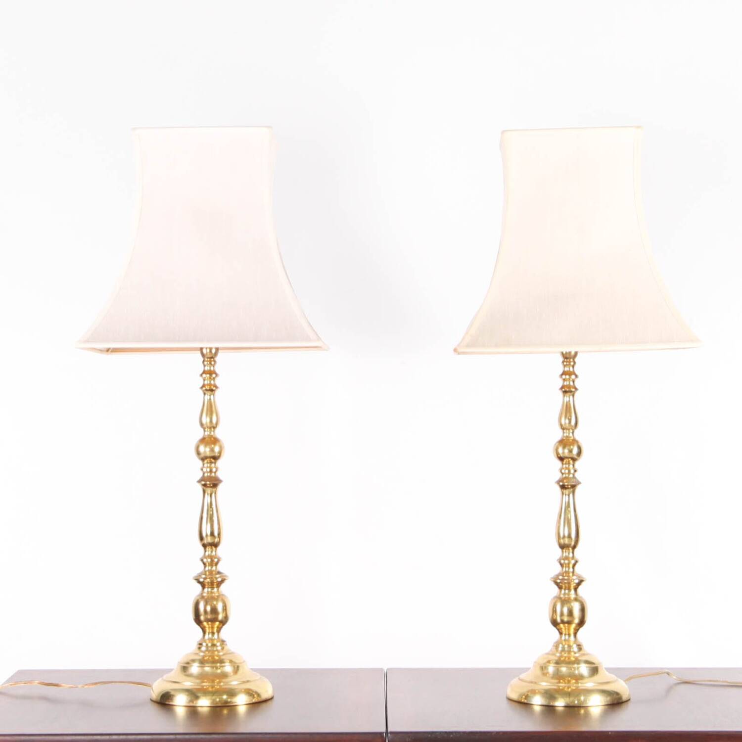 Pair of large brass lamps