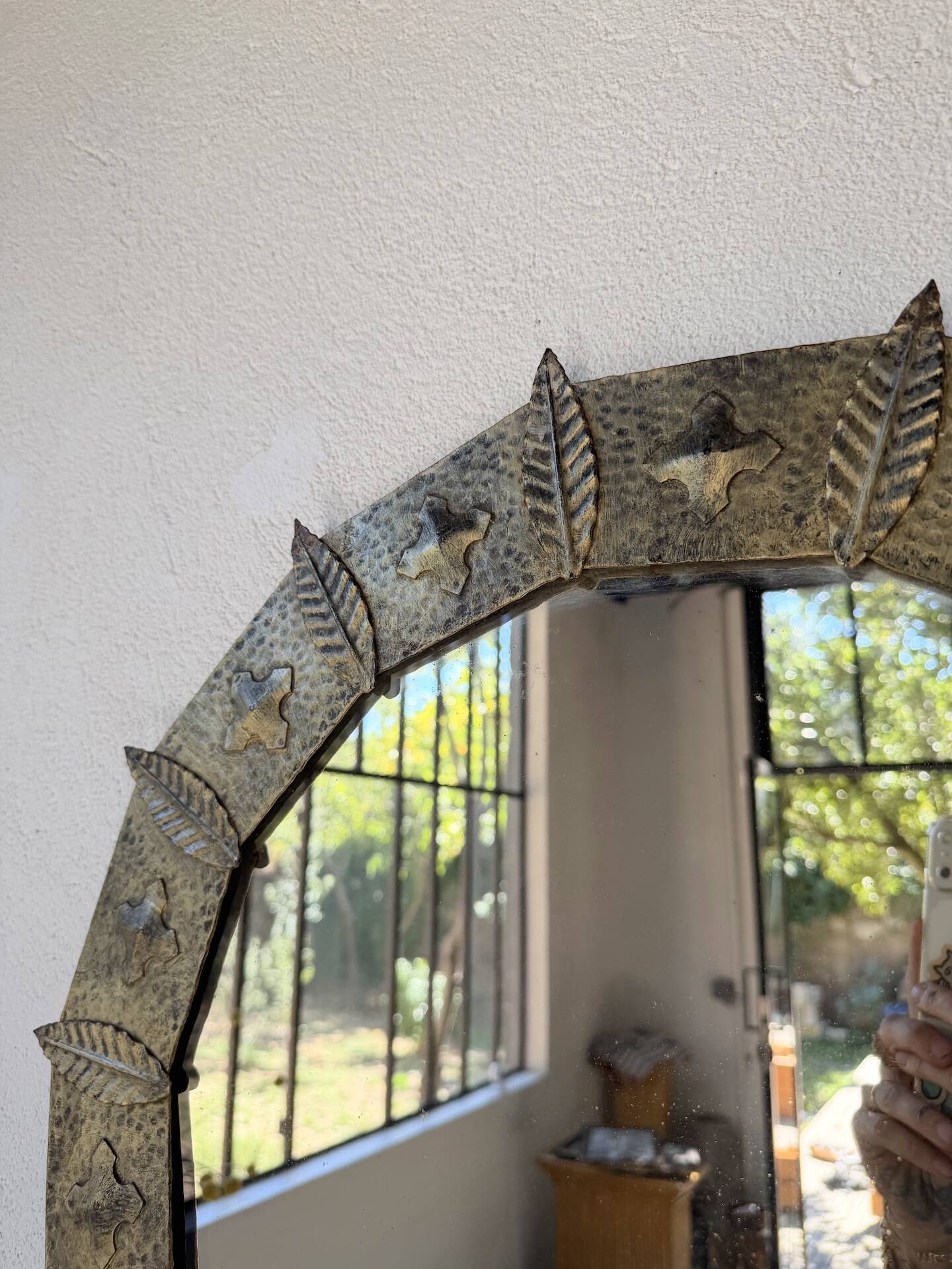 Brutalist round hammered gold metal mirror