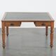 Antique writing table / partner desk with 4 drawers and a green leather top