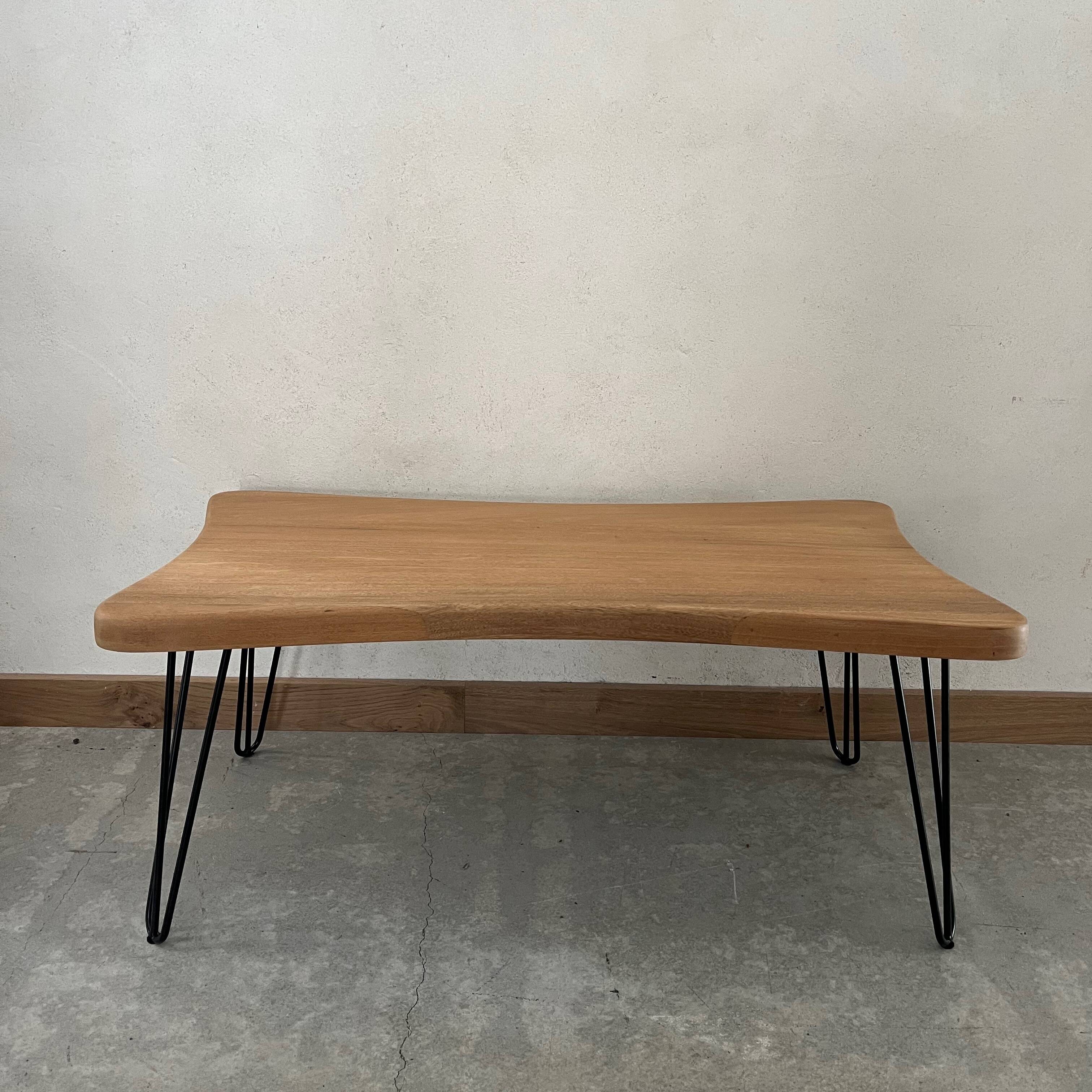 Wooden coffee table with metal legs