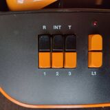 Vintage orange telic phone with ptt dial