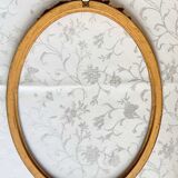 Oval frame with gilded pediments 19th wood and stucco