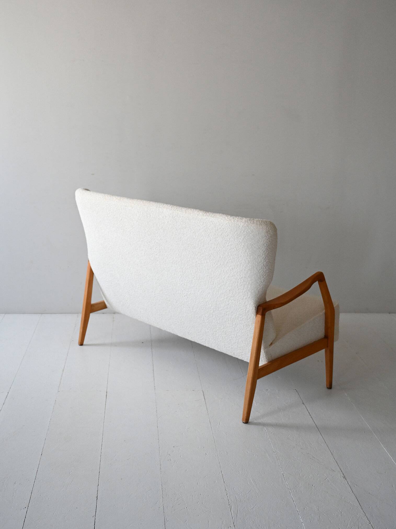 Vintage Scandinavian sofa with faux lambskin