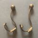 Pair of brass coat hooks