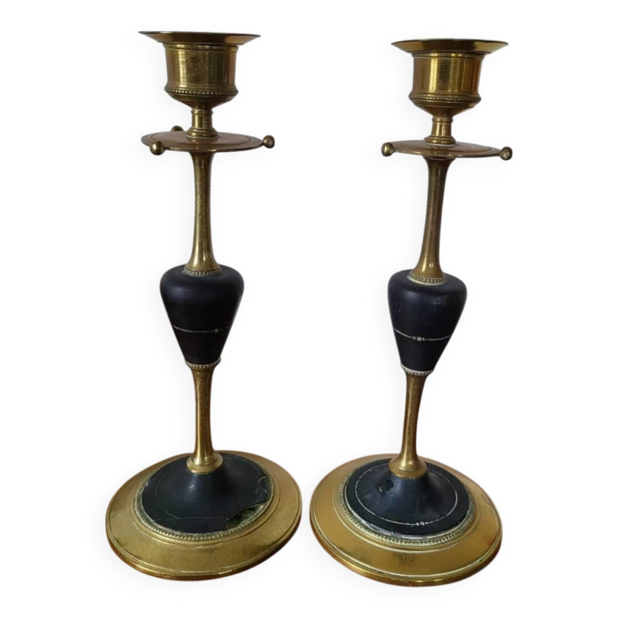Pair of brass and black hard stone candlesticks