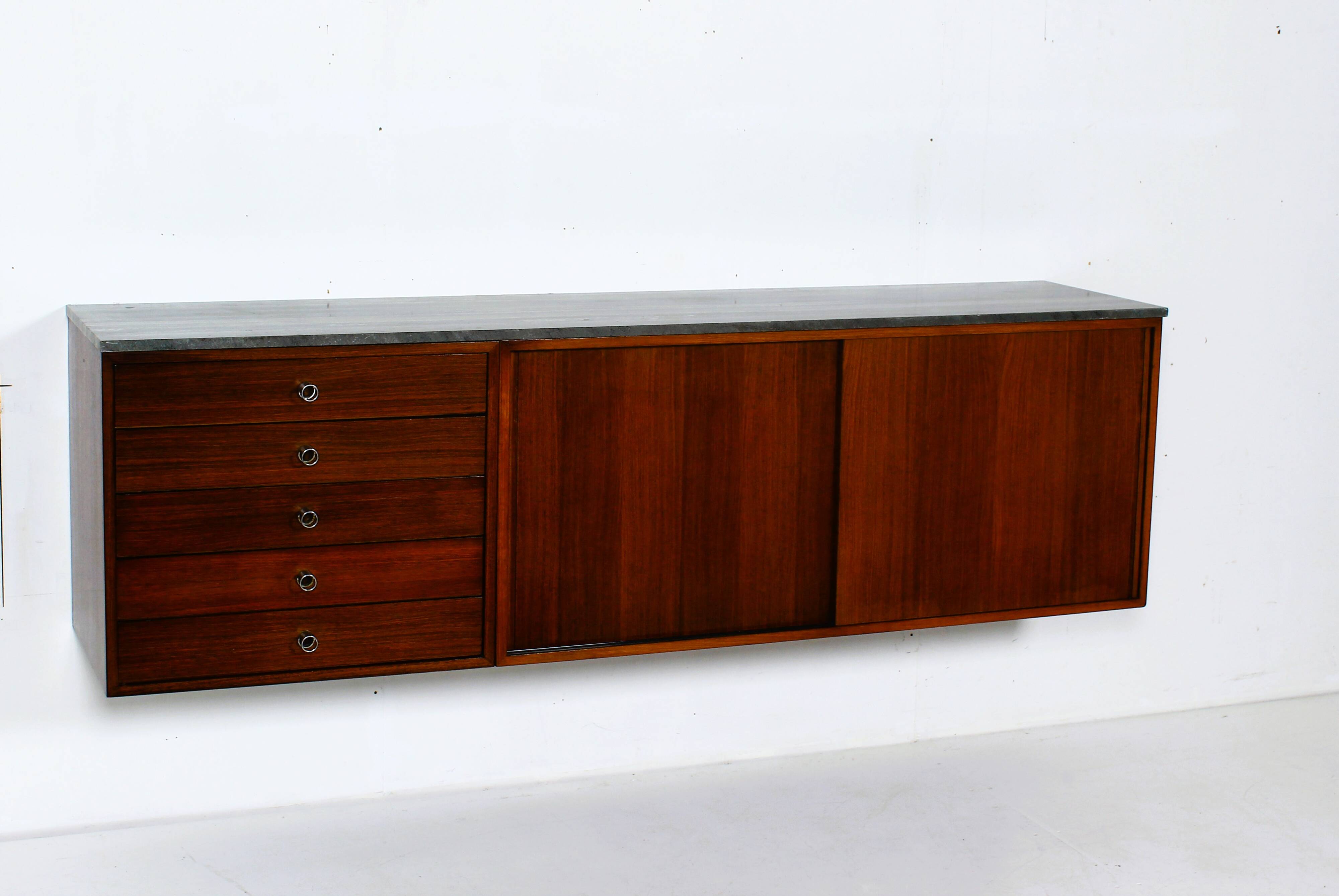 Suspended teak buffet from the 1970s.