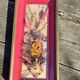 Frame containing dried flowers