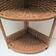 Corner shelf made of vintage braided natural fibers