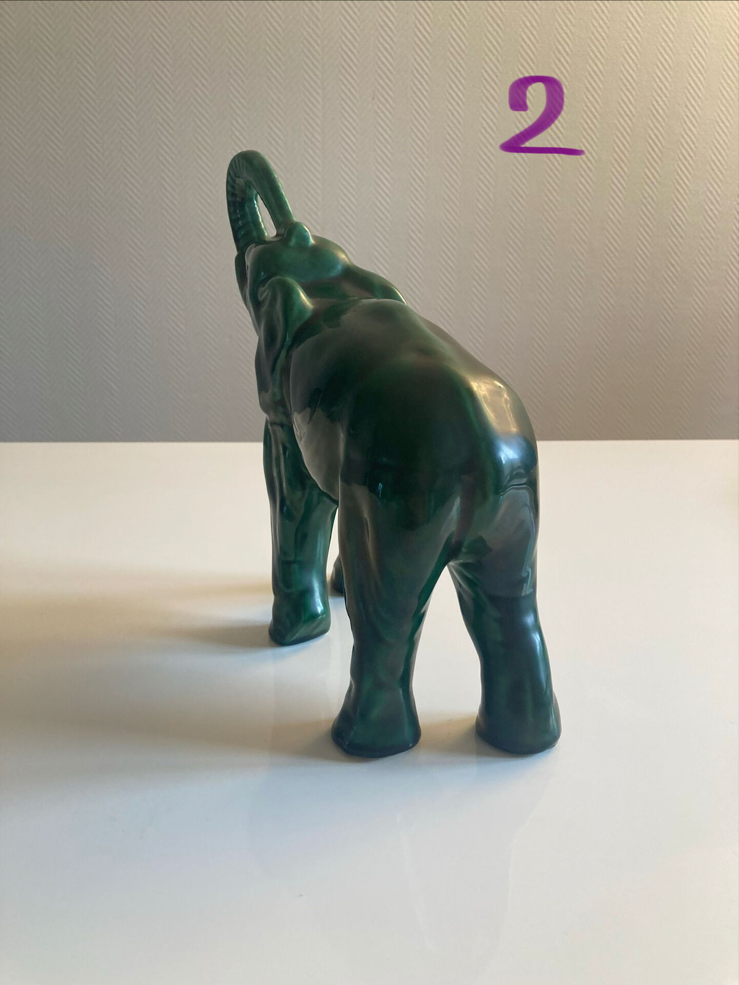 Pair of marbled faience elephants from Saint Clément
