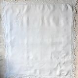pillowcase embroidered with flowers and monogrammed festoons LK