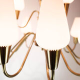 Lamp with arms of brass and glass, of Danish design from the 1950s