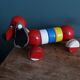 Lacquered wooden pull-along dog toy