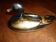 Black and gold wooden duck