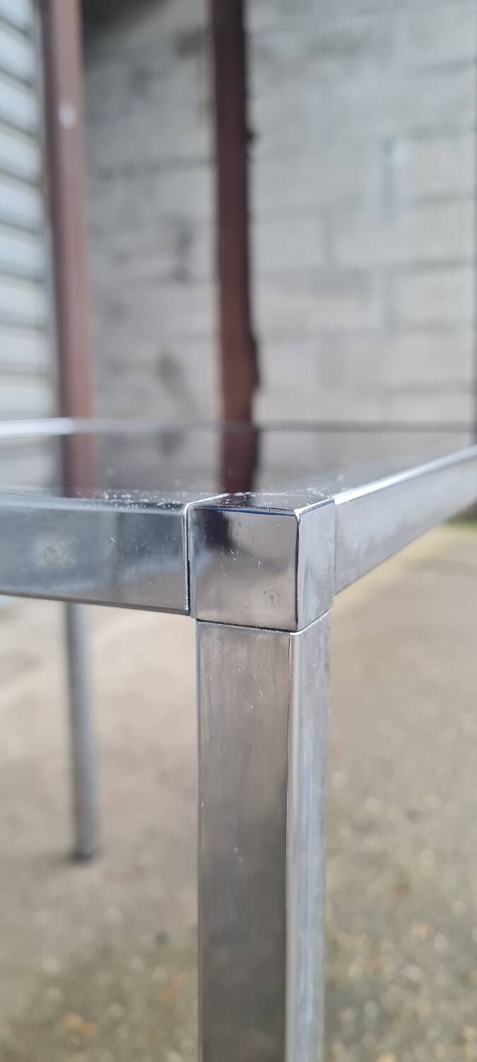 Pair of side tables in chrome metal and glass