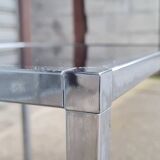 Pair of side tables in chrome metal and glass