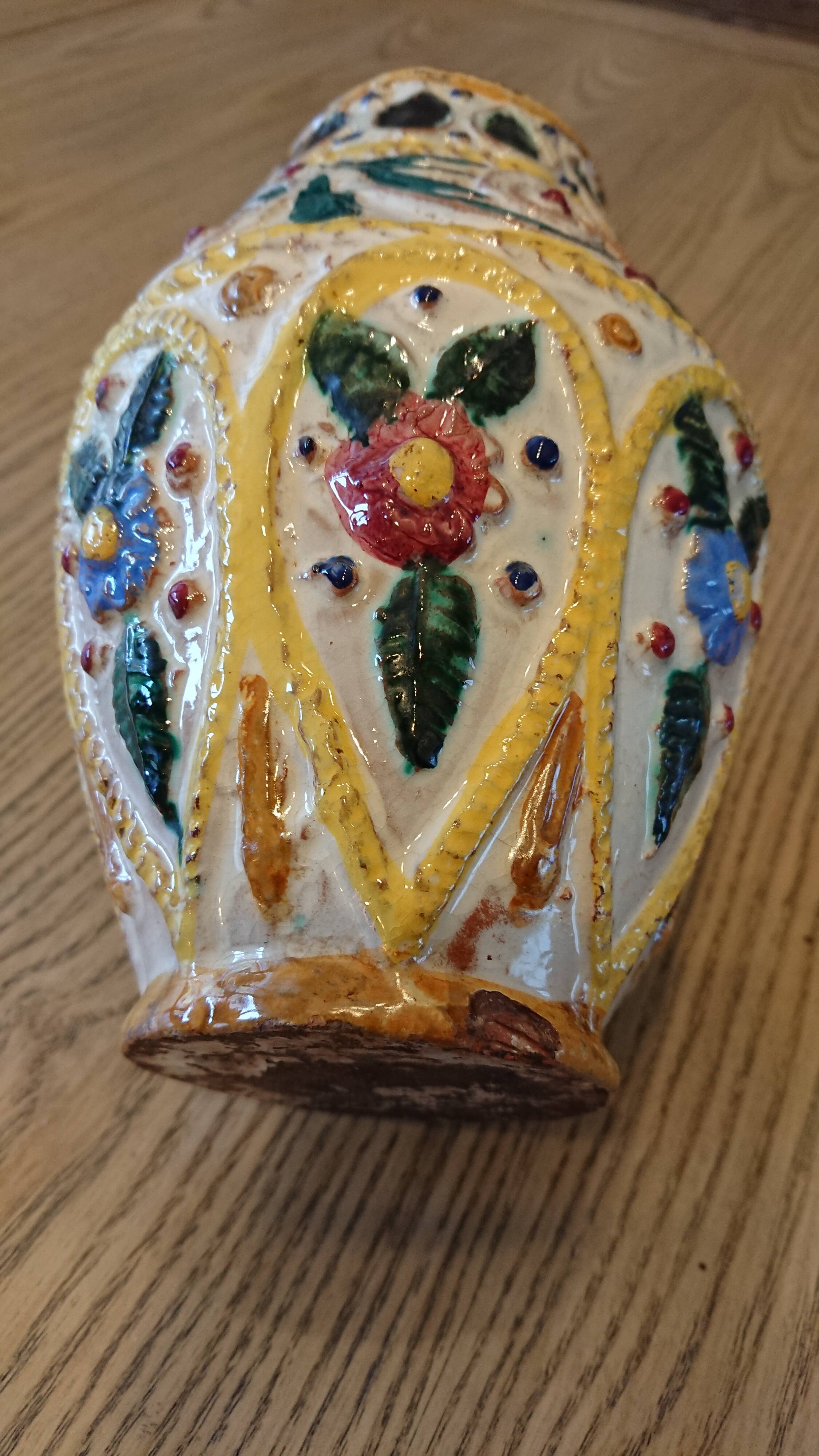 Hand-carved and hand-painted vase