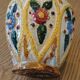 Hand-carved and hand-painted vase
