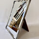Antique framed mirror, bevelled glass and silver-plated metal frame, 1930-1940.