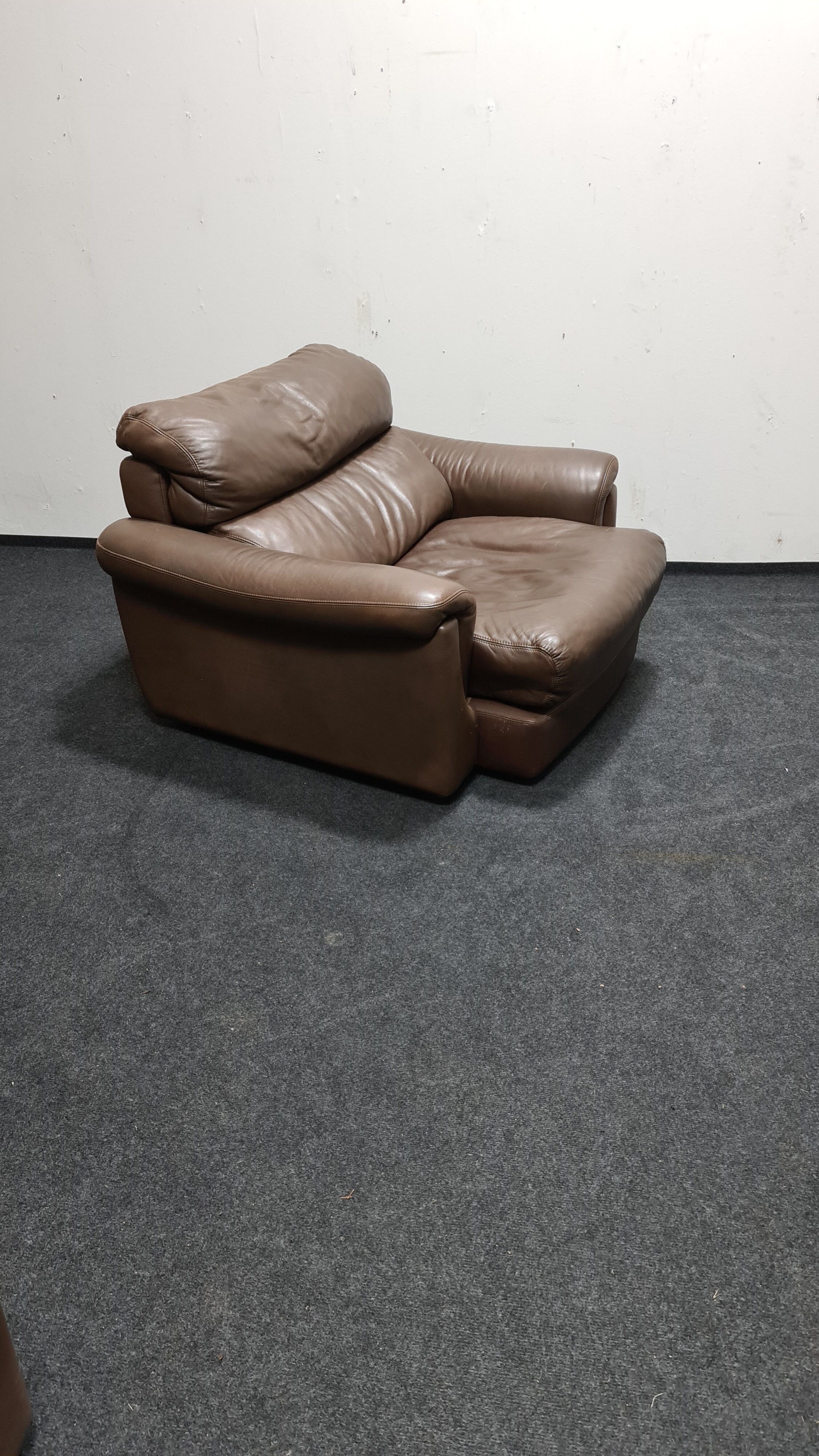 Fauteuil Rolf Benz en cuir brun vintage