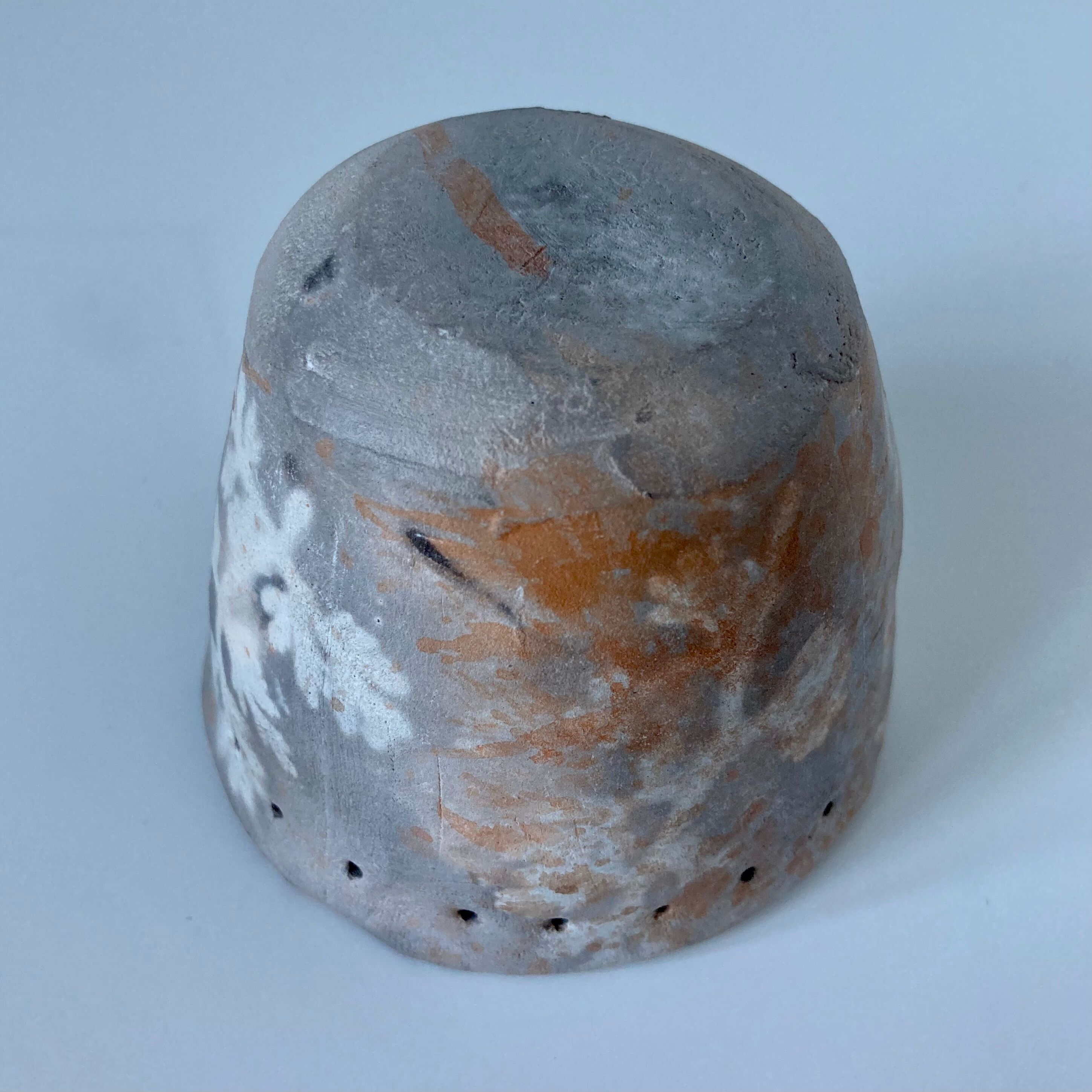 Signed ceramic pot with plant decoration