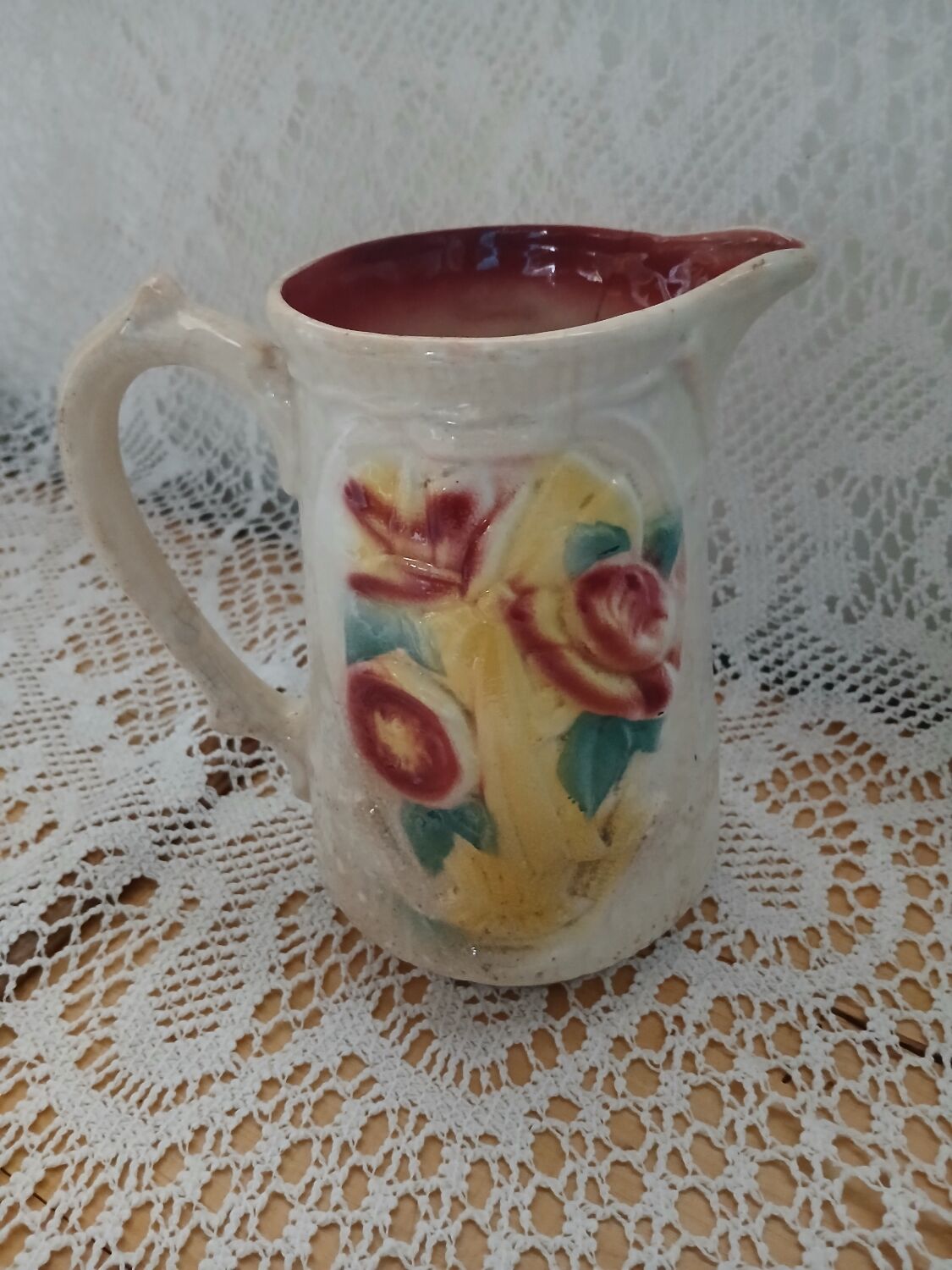 Antique earthenware pitcher