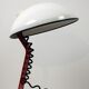 White and red steel desk lamp