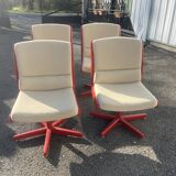 Set of 4 vintage 1970s swivel chairs in red and beige.