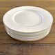 White and gold porcelain dinner plates