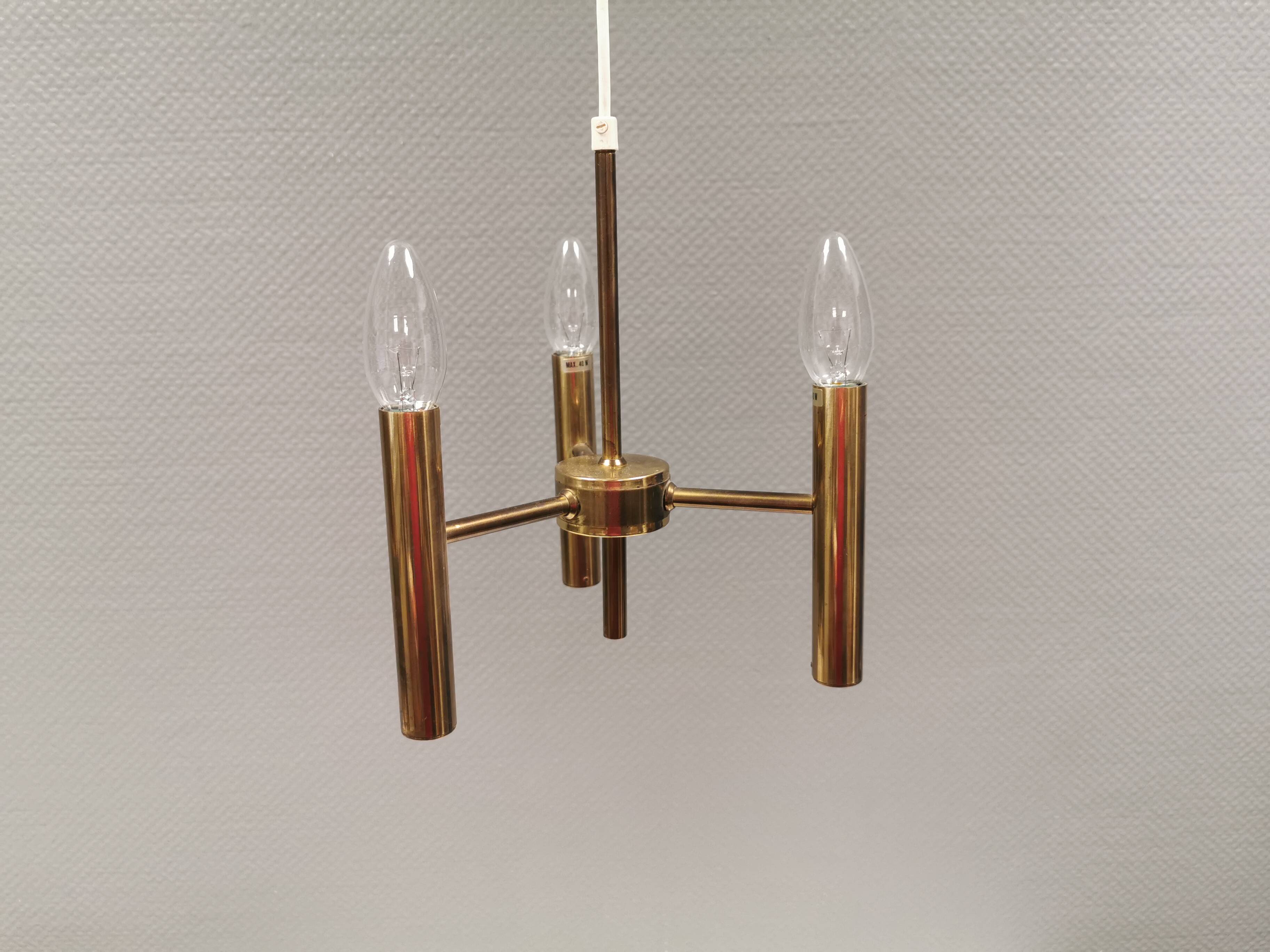 Chandelier with 3 light sources, made of metal and brass. 1960-70s