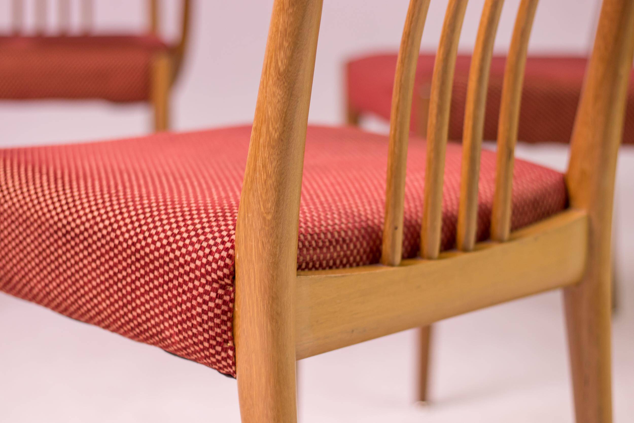 Set of six carved walnut dining chairs, Italy, 1955