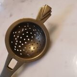 Art deco tea colander