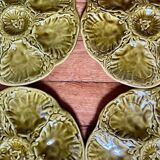 Set of 8 oyster plates in barbotine