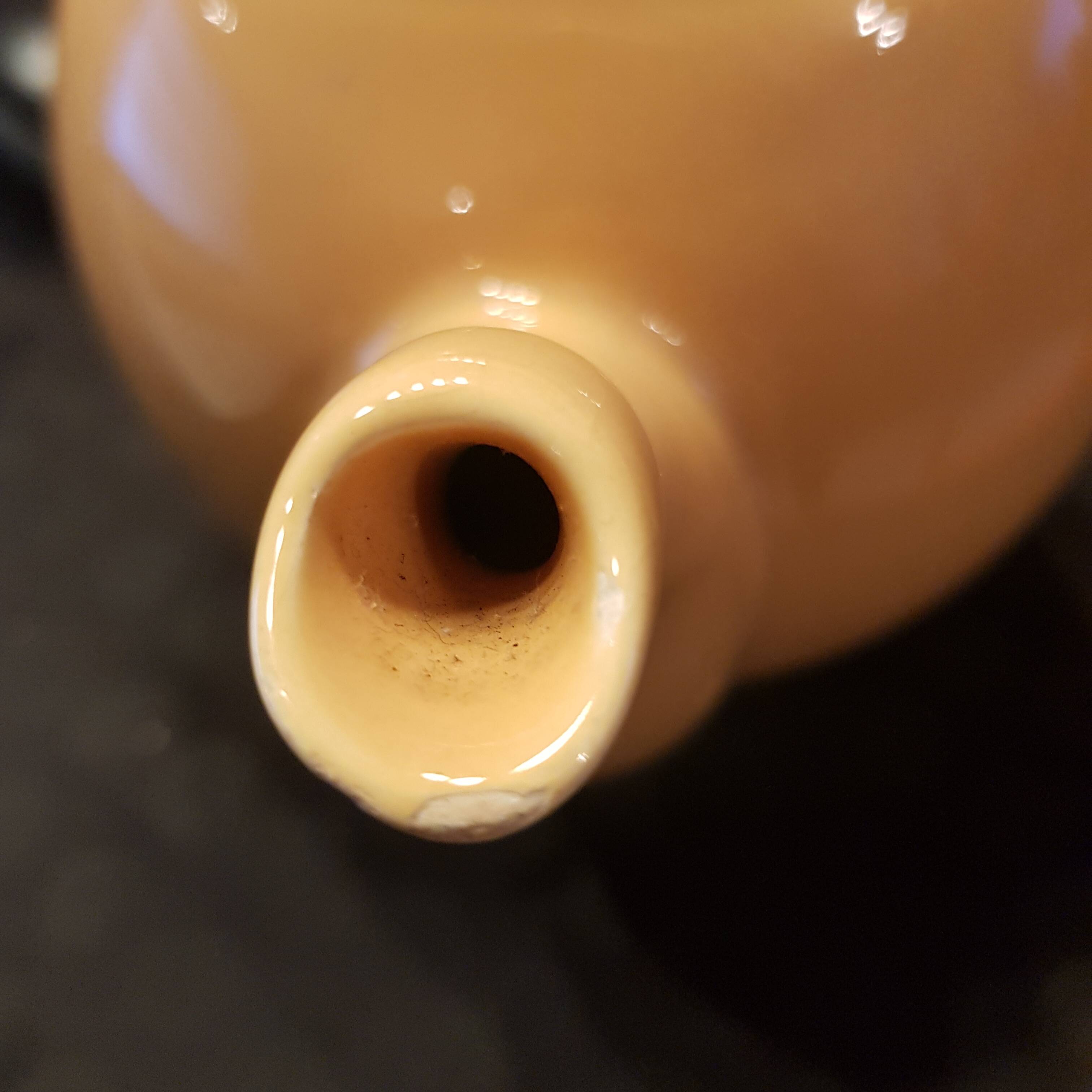 Yellow ceramic teapot