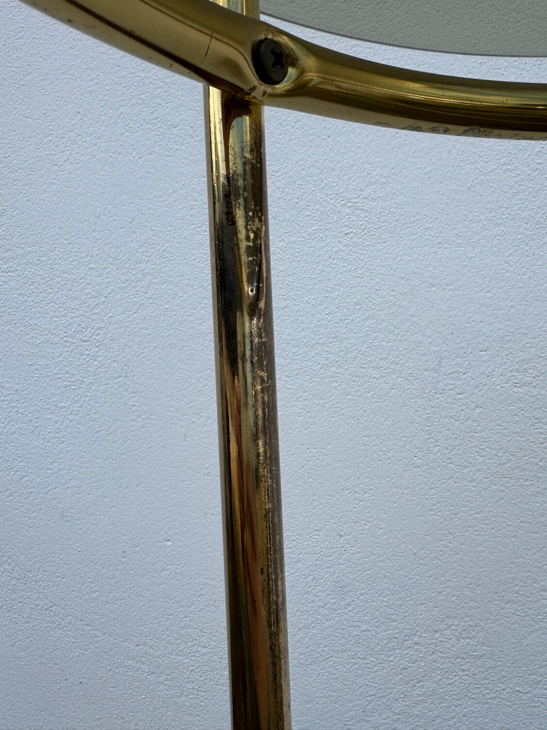 Golden tripod stand with smoked glass from the 1970s.