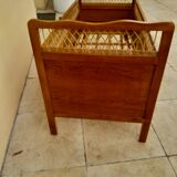 Vintage baby bed in wood and rattan from the 60s for children