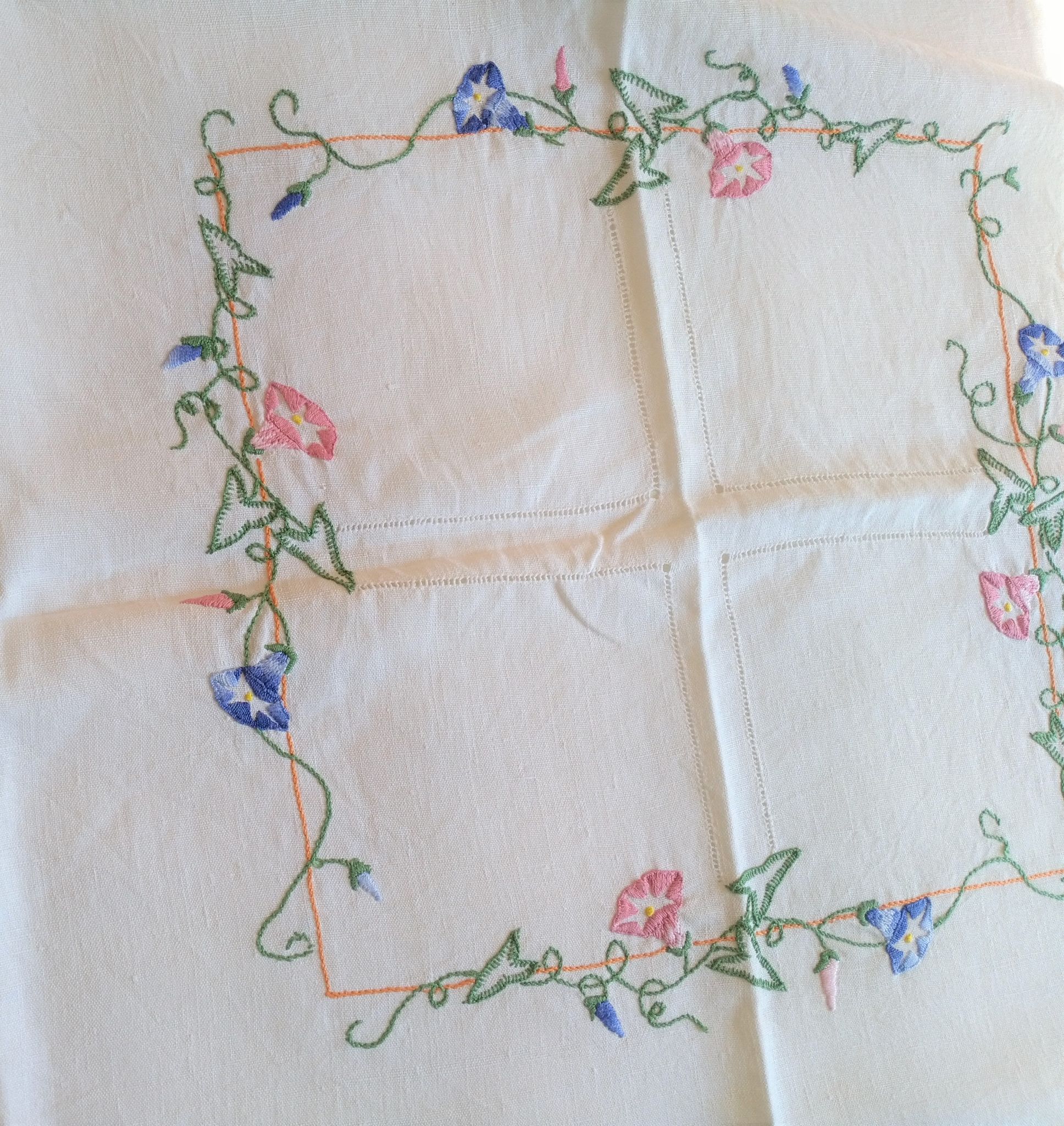 Antique linen tablecloth embroidered with flowers
