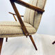 A pair vintage cocktail chairs with stripes and metal screws
