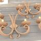 Four antique wrought iron wall lights