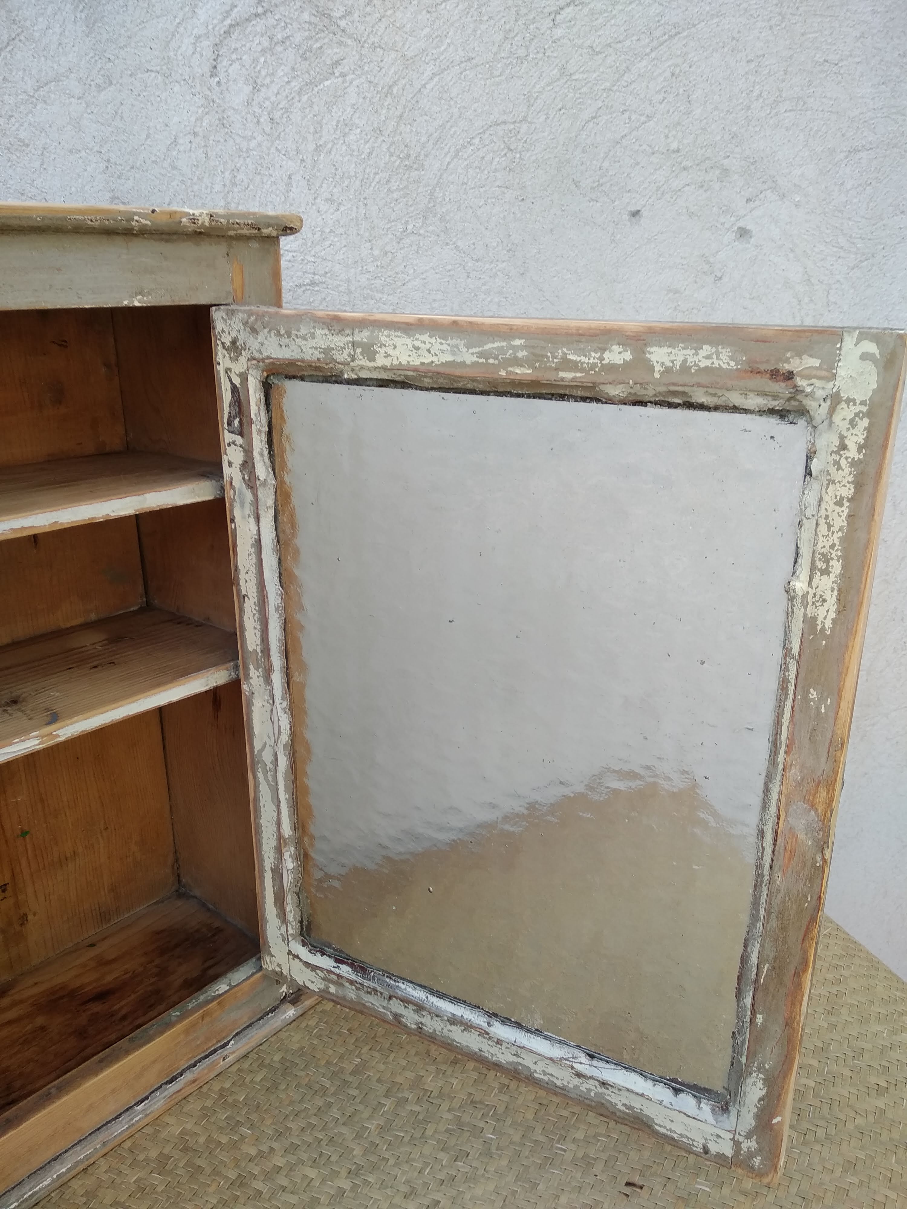 Antique wooden bathroom cabinet patinated