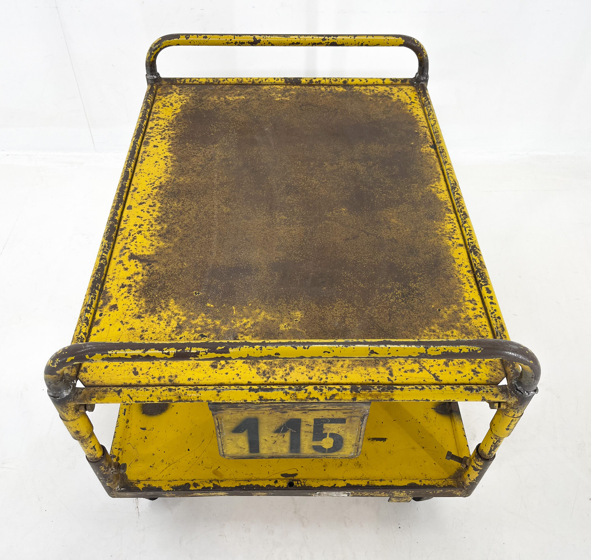 Vintage industrial coffee or side table on wheels