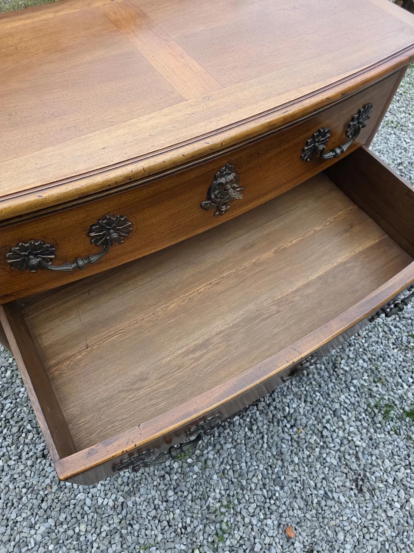Curved Louis XV style chest of drawers in solid walnut