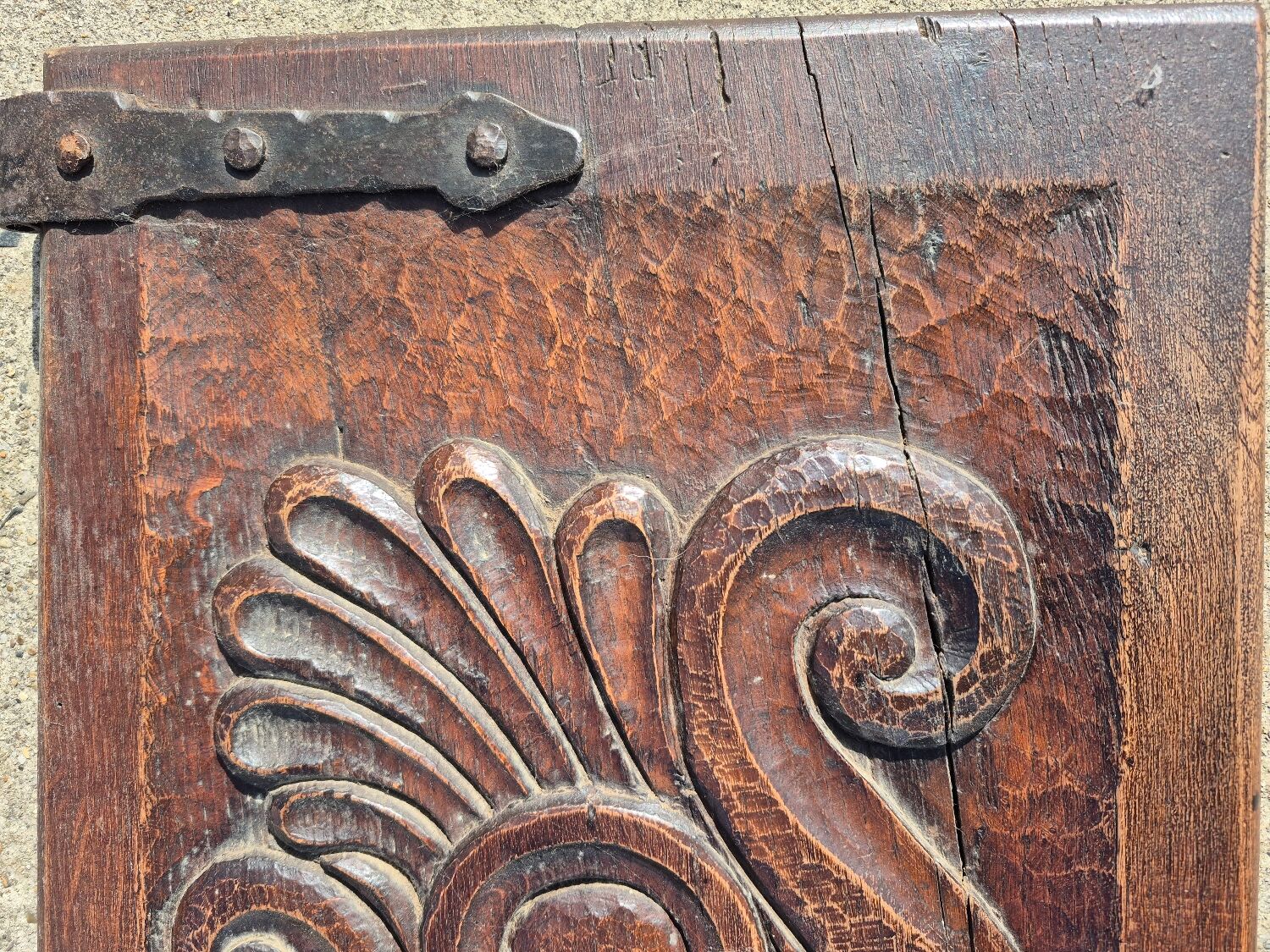 antique cabinet with carvings and wrought iron fittings rural