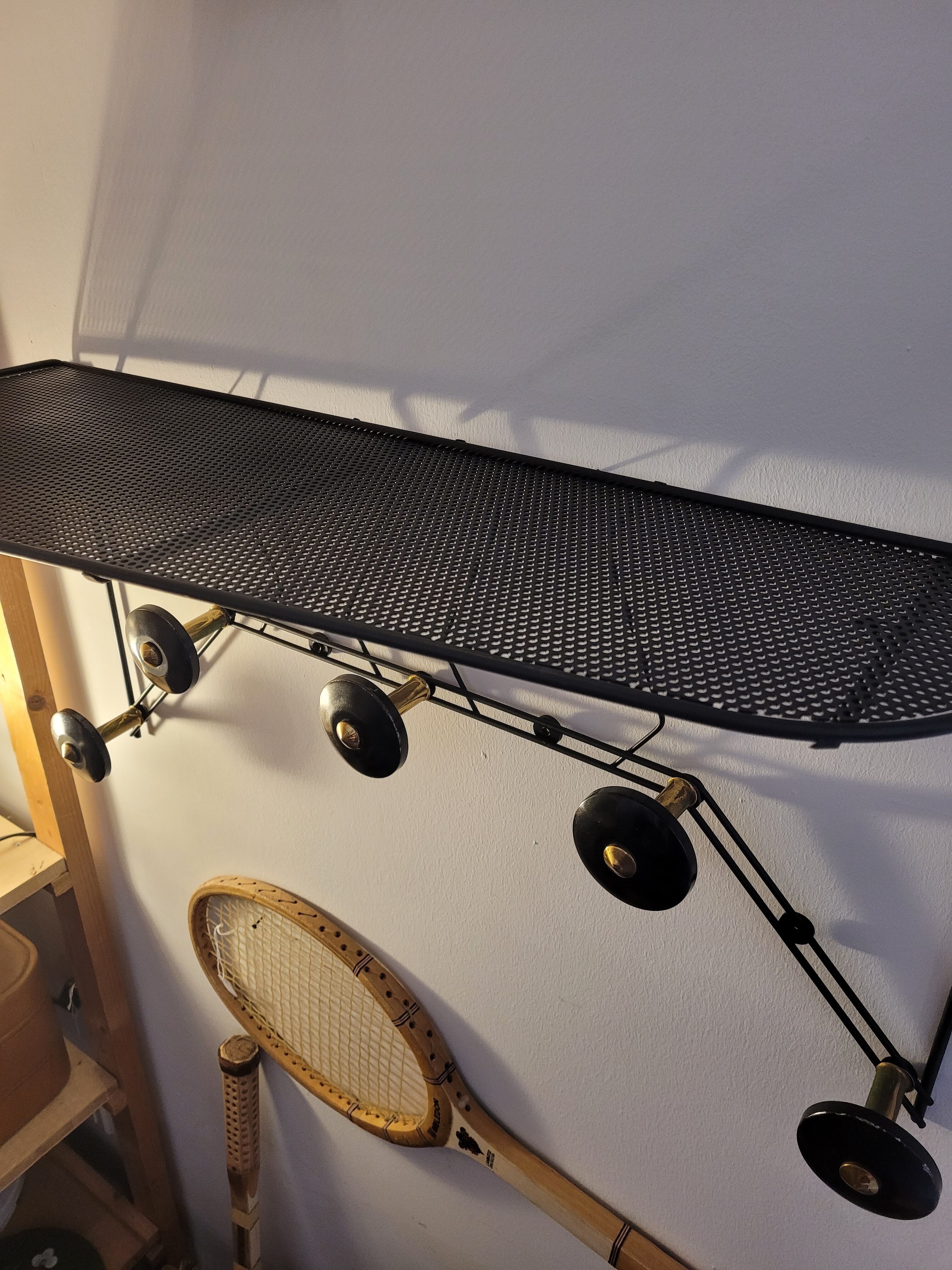 1950s wall-mounted coat rack