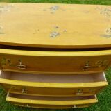 Old bohemian chest of drawers from the 30s with its floral prints in solid wood