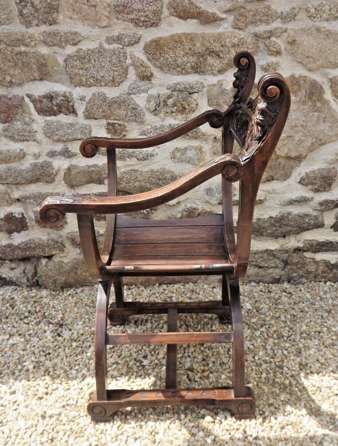 Dagobert armchair curule hard carved walnut demon head detail 3675