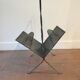 Perforated metal magazine rack 1950
