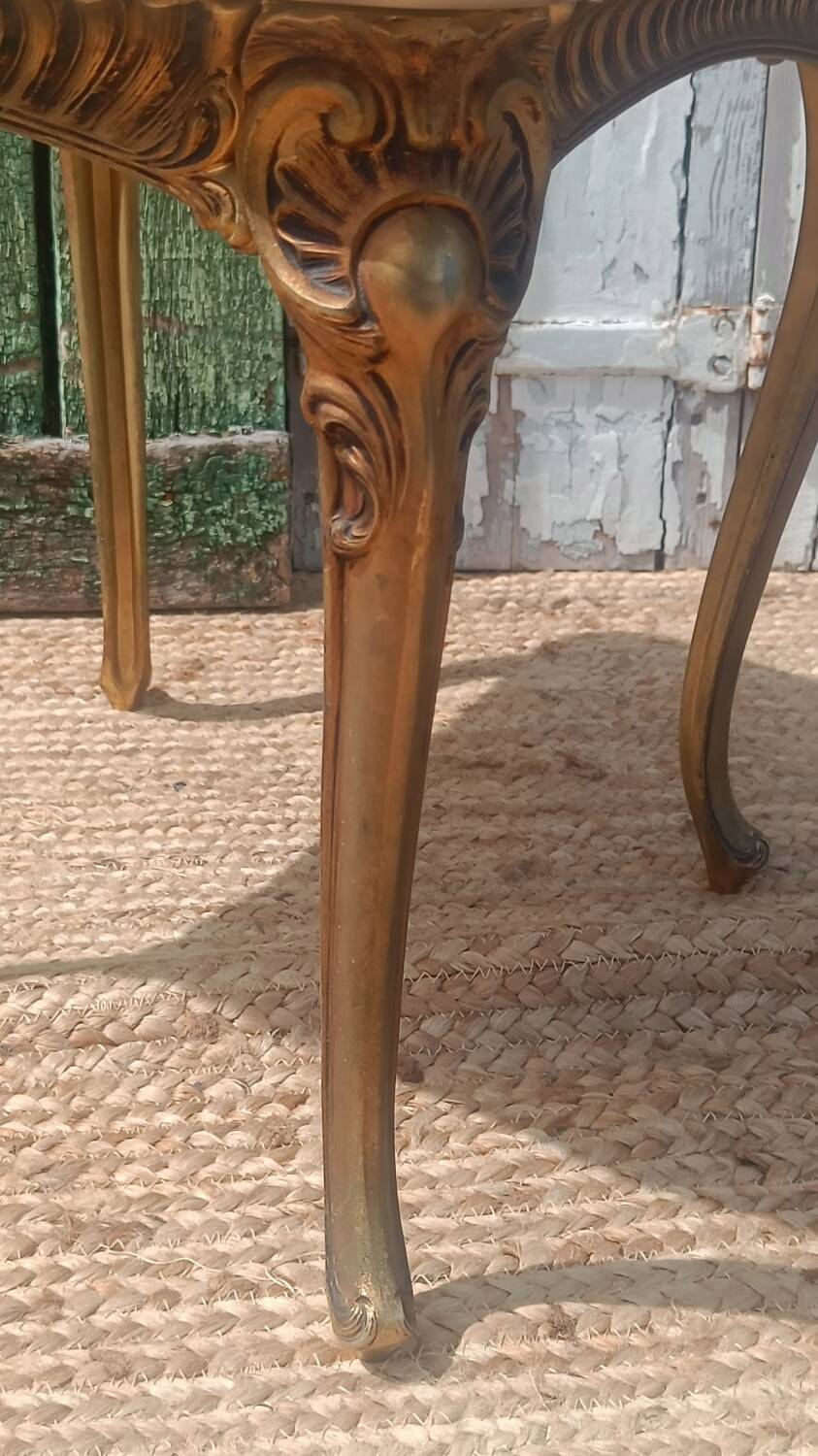 Vintage side table in gilded brass with an onyx top.